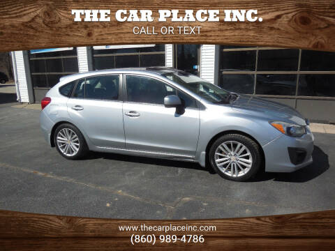 2012 Subaru Impreza for sale at THE CAR PLACE INC. in Somersville CT