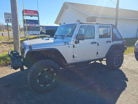 2010 Jeep Wrangler Unlimited for sale at CRYSTAL MOTORS SALES in Rome NY