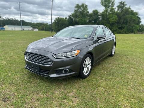 2016 Ford Fusion for sale at SELECT AUTO SALES in Mobile AL
