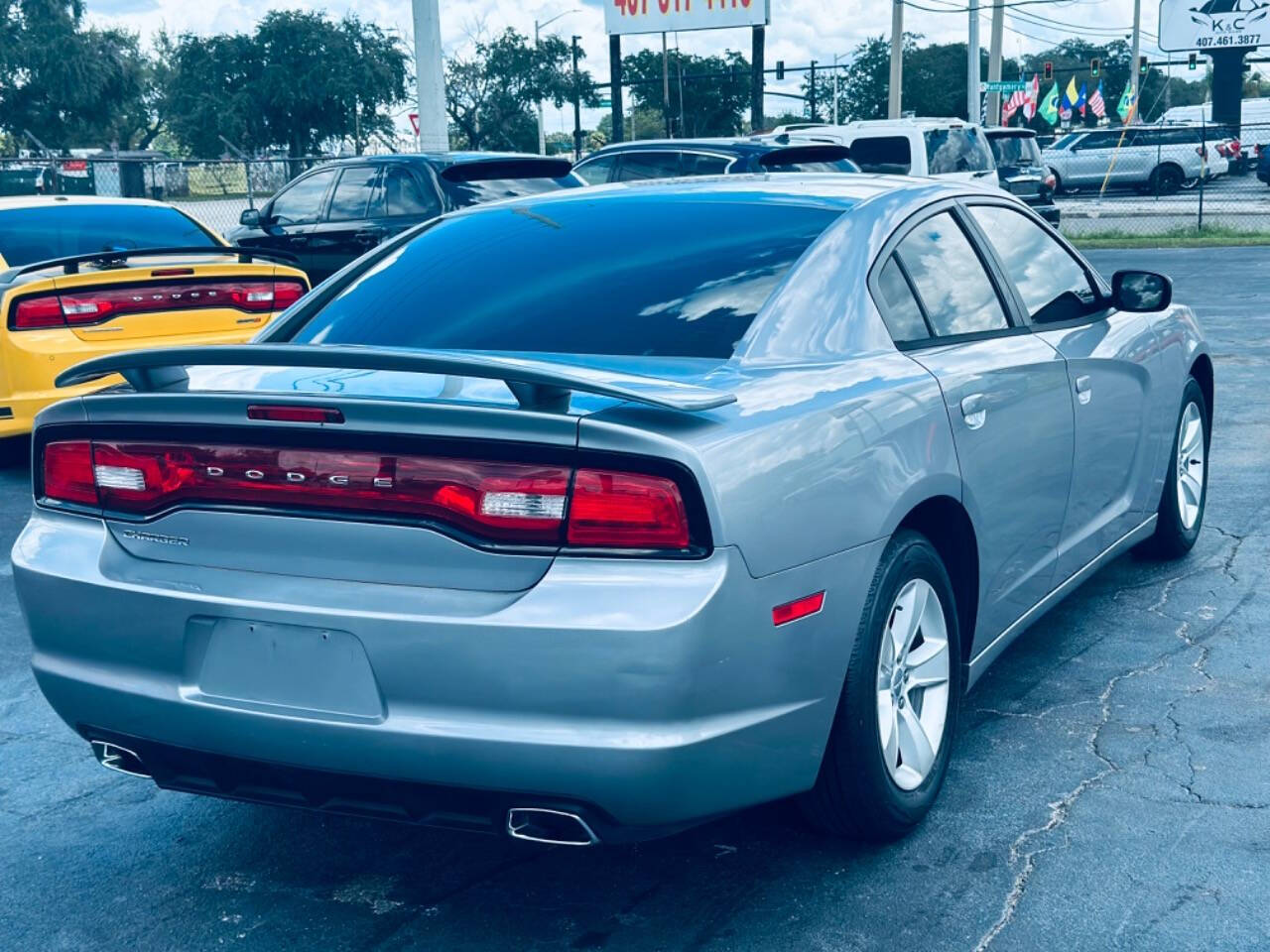 2013 Dodge Charger for sale at NOVA AUTO SALES in Orlando, FL