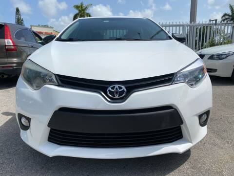 2014 Toyota Corolla for sale at Plus Auto Sales in West Park FL