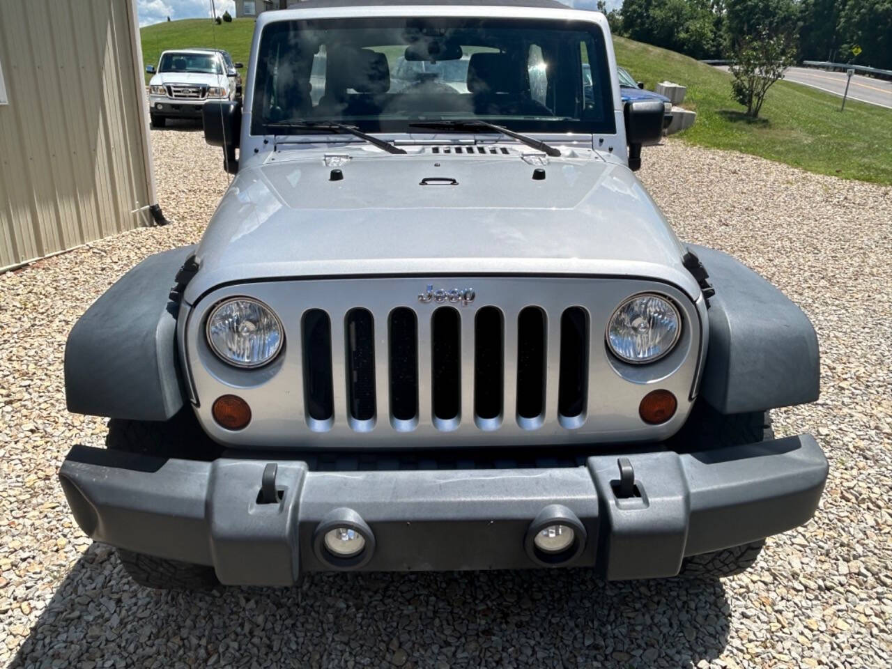 2012 Jeep Wrangler Unlimited for sale at STRODES AUTO GROUP LLP in Malta, OH