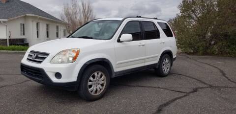 2005 Honda CR-V for sale at KHAN'S AUTO LLC in Worland WY