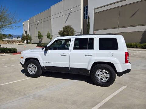 2014 Jeep Patriot for sale at E and M Auto Sales in Bloomington CA