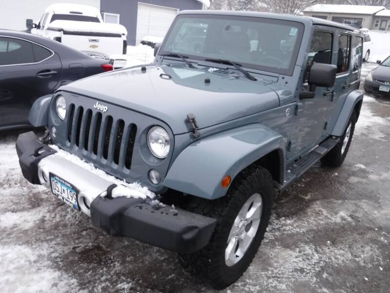 2014 Jeep Wrangler Unlimited for sale at J & K Auto - J and K in Saint Bonifacius MN
