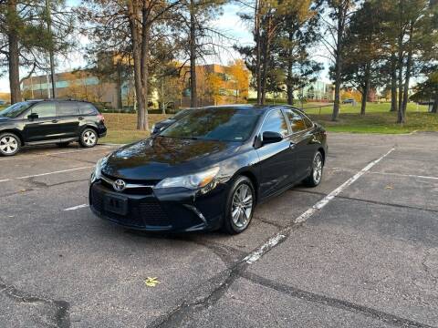 2015 Toyota Camry for sale at QUEST MOTORS in Englewood CO