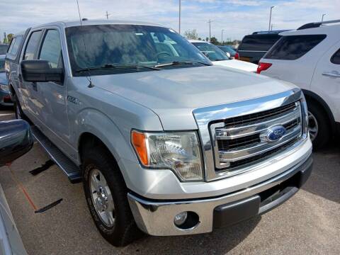 2013 Ford F-150 for sale at CHEAPIE AUTO SALES INC in Metairie LA