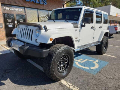 2016 Jeep Wrangler Unlimited for sale at Sawnee Mountain Motors in Cumming GA