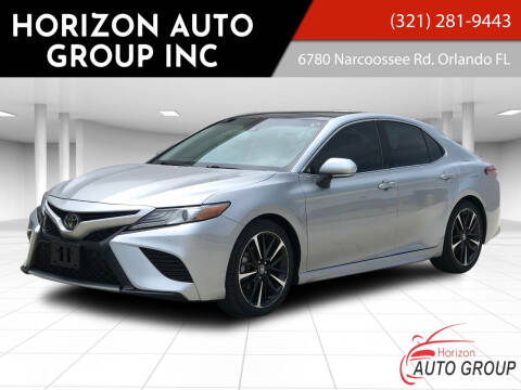 2018 Toyota Camry for sale at HORIZON AUTO GROUP INC in Orlando FL