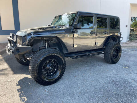 2016 Jeep Wrangler Unlimited for sale at EA Motorgroup in Austin TX