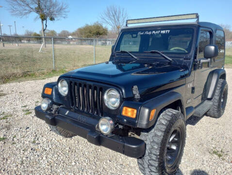 2004 Jeep Wrangler for sale at LA PULGA DE AUTOS in Dallas TX