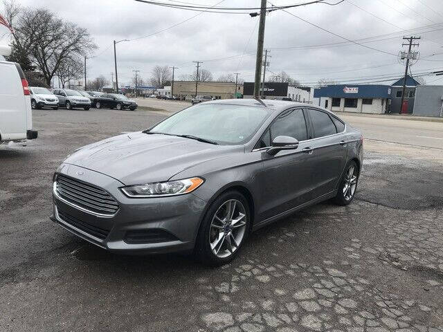 2013 Ford Fusion for sale at FAB Auto Inc in Roseville MI