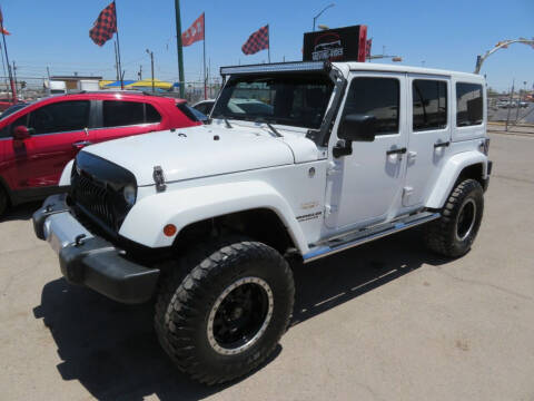 2012 Jeep Wrangler Unlimited for sale at Moving Rides in El Paso TX