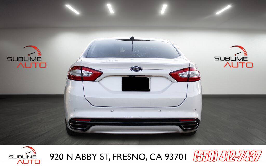 2014 Ford Fusion for sale at SUBLIME AUTO in Fresno, CA