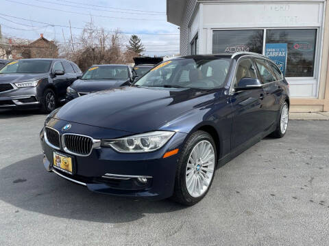 2014 BMW 3 Series for sale at ADAM AUTO AGENCY in Rensselaer NY