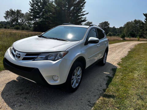 2013 Toyota RAV4 for sale at Hammer Auto LLC in Stanwood MI