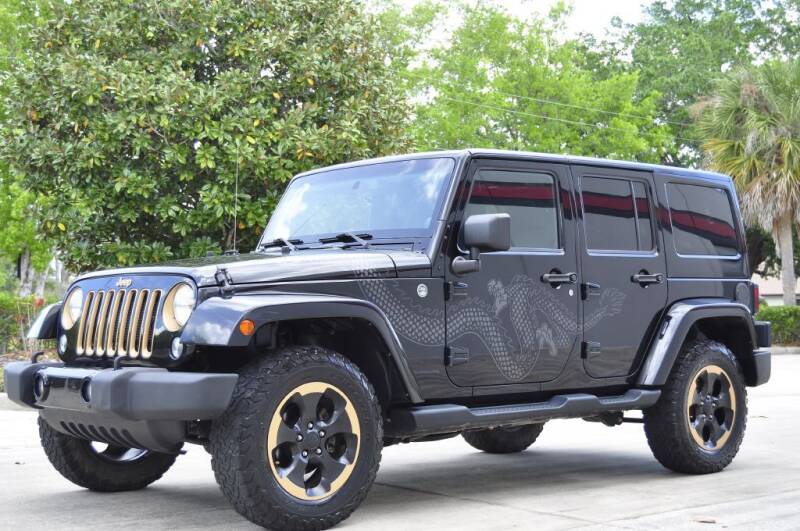 2014 Jeep Wrangler Unlimited for sale at Vision Motors, Inc. in Winter Garden FL