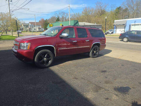 2011 Chevrolet Suburban for sale at Maximum Auto Group II INC in Cortland OH