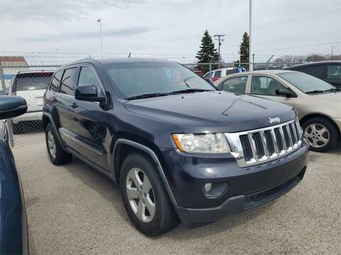 2011 Jeep Grand Cherokee for sale at Betten Baker Preowned Center in Twin Lake MI
