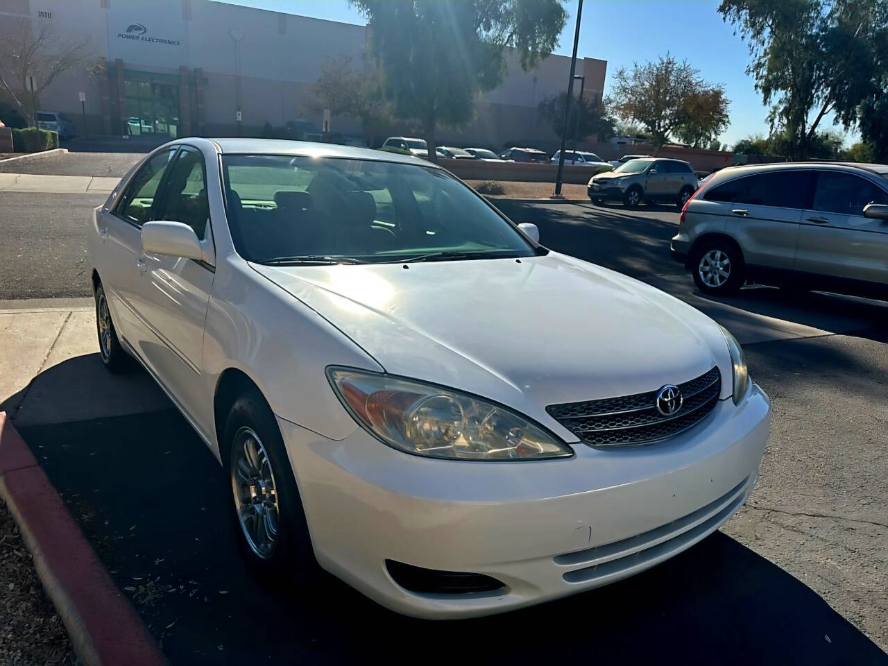 2002 Toyota Camry for sale at HUDSONS AUTOS in Gilbert, AZ