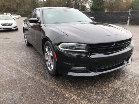 2015 Dodge Charger for sale at Certified Motors LLC in Mableton GA