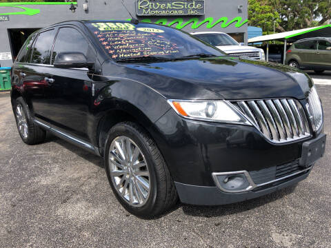 2013 Lincoln MKX for sale at RIVERSIDE MOTORCARS INC - Main Lot in New Smyrna Beach FL