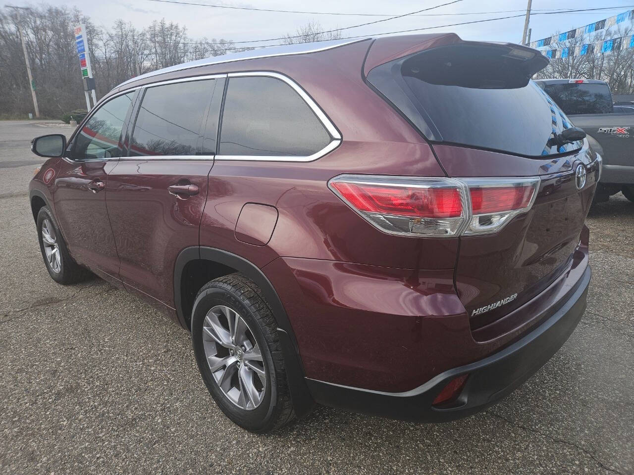 2015 Toyota Highlander for sale at DANGO AUTO SALES in HOWARD CITY, MI