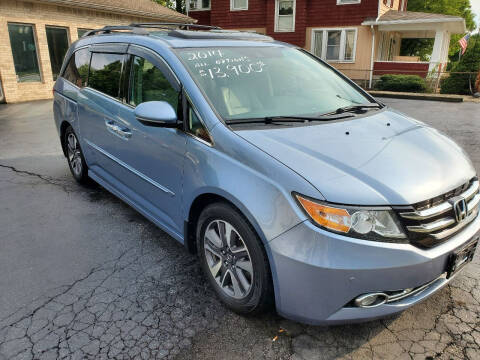 2014 Honda Odyssey for sale at MADDEN MOTORS INC in Peru IN