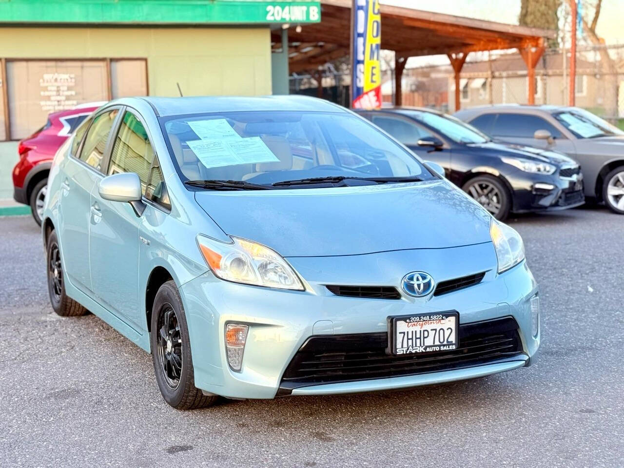 2014 Toyota Prius for sale at STARK AUTO SALES INC in Modesto, CA