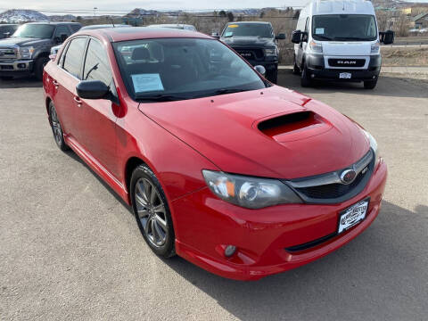 2009 Subaru Impreza for sale at BERKENKOTTER MOTORS in Brighton CO