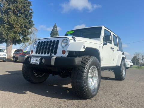 2013 Jeep Wrangler Unlimited for sale at Pacific Auto LLC in Woodburn OR