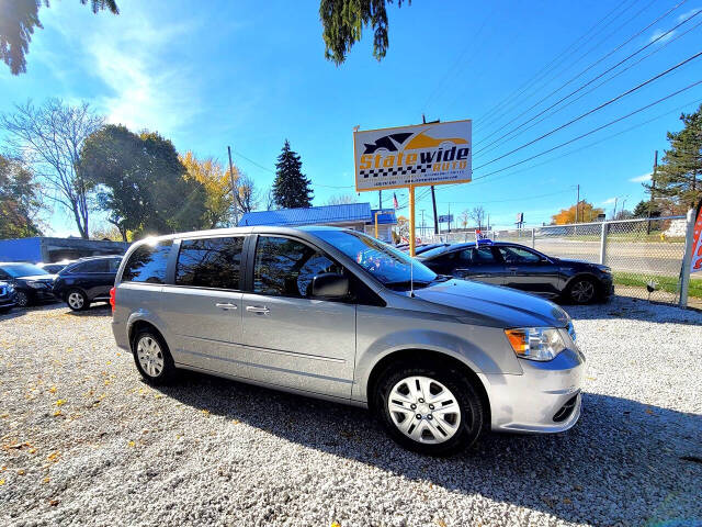 2014 Dodge Grand Caravan for sale at Statewide Auto LLC in Akron, OH