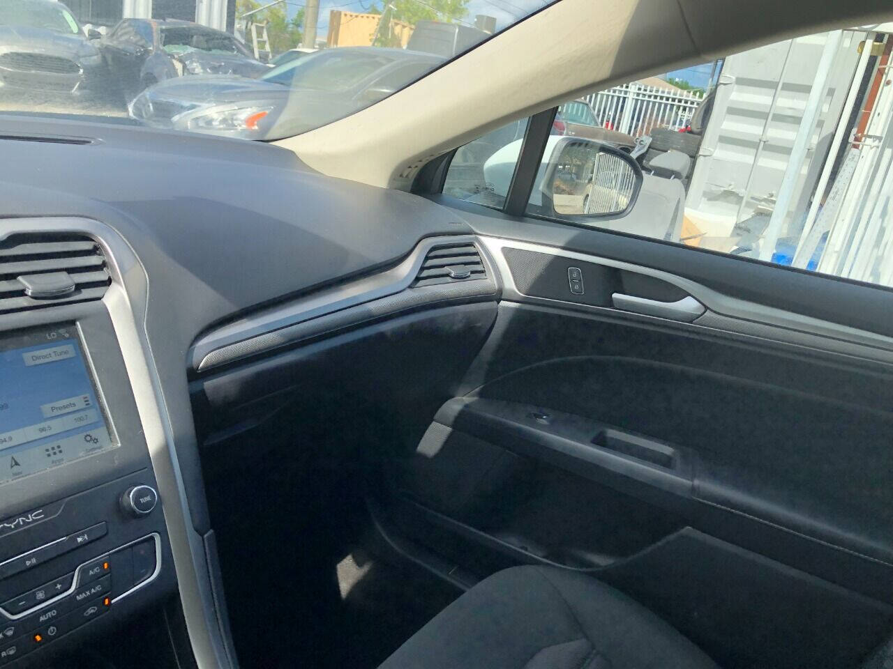 2019 Ford Fusion Hybrid  - $15,500