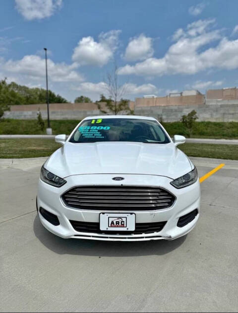 2013 Ford Fusion Hybrid for sale at Arc Auto Sales in Omaha, NE