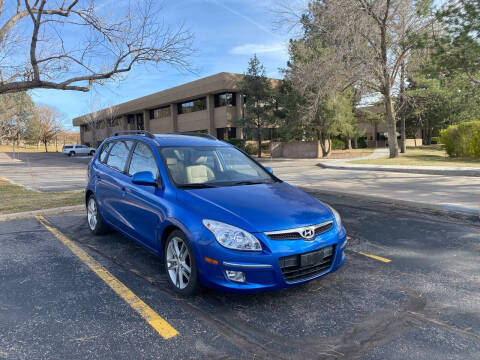 2010 Hyundai Elantra Touring for sale at QUEST MOTORS in Centennial CO