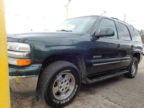 2001 Chevrolet Tahoe for sale at RPM AUTO SALES - LANSING SOUTH in Lansing MI