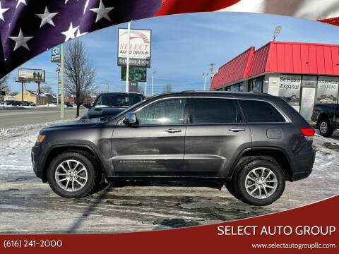 2015 Jeep Grand Cherokee for sale at Select Auto Group in Wyoming MI