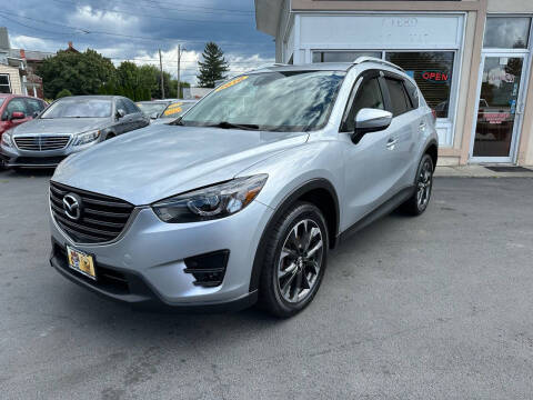 2016 Mazda CX-5 for sale at ADAM AUTO AGENCY in Rensselaer NY