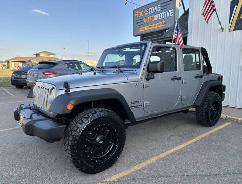 2014 Jeep Wrangler Unlimited for sale at Rockstone Automotive Inc in Monticello MN