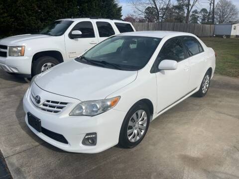 2013 Toyota Corolla for sale at Getsinger's Used Cars in Anderson SC