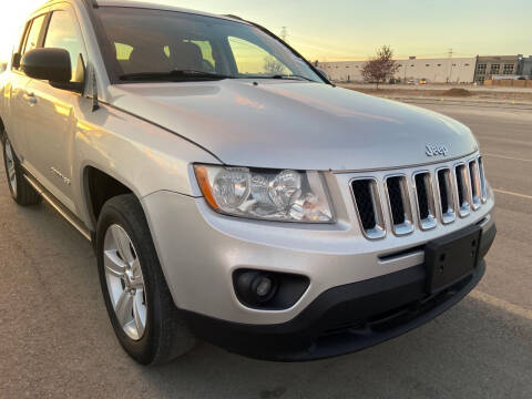 2013 Jeep Compass for sale at BELOW BOOK AUTO SALES in Idaho Falls ID