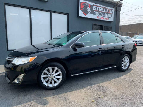 2013 Toyota Camry for sale at Stallion Auto Group in Paterson NJ