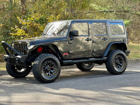 2012 Jeep Wrangler Unlimited for sale at H and S Auto Group in Canton GA