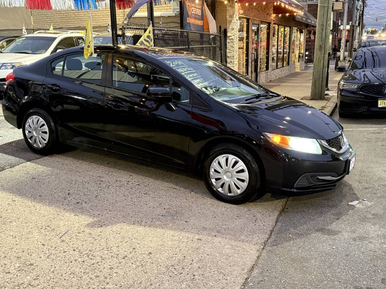 2014 Honda Civic LX 4dr Sedan CVT - Black exterior view 2