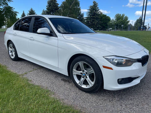 2014 BMW 3 Series for sale at BELOW BOOK AUTO SALES in Idaho Falls ID