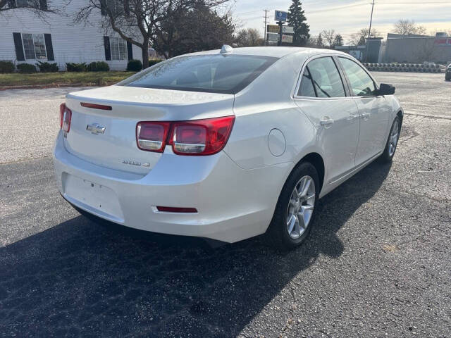 2013 Chevrolet Malibu for sale at DECKER AUTO SALES in Bay City, MI