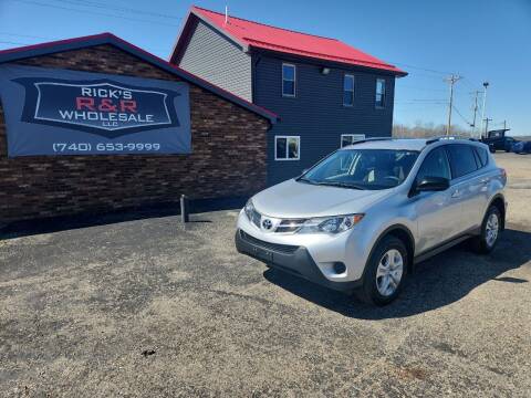 2013 Toyota RAV4 for sale at Rick's R & R Wholesale, LLC in Lancaster OH