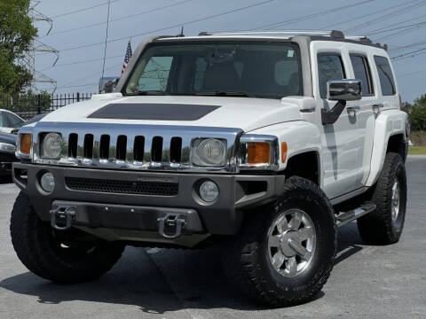 2007 HUMMER H3 for sale at Atlanta Unique Auto Sales in Norcross GA