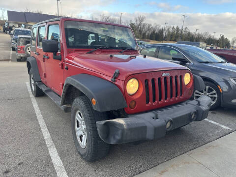 2010 Jeep Wrangler Unlimited for sale at Postal Pete in Galena IL