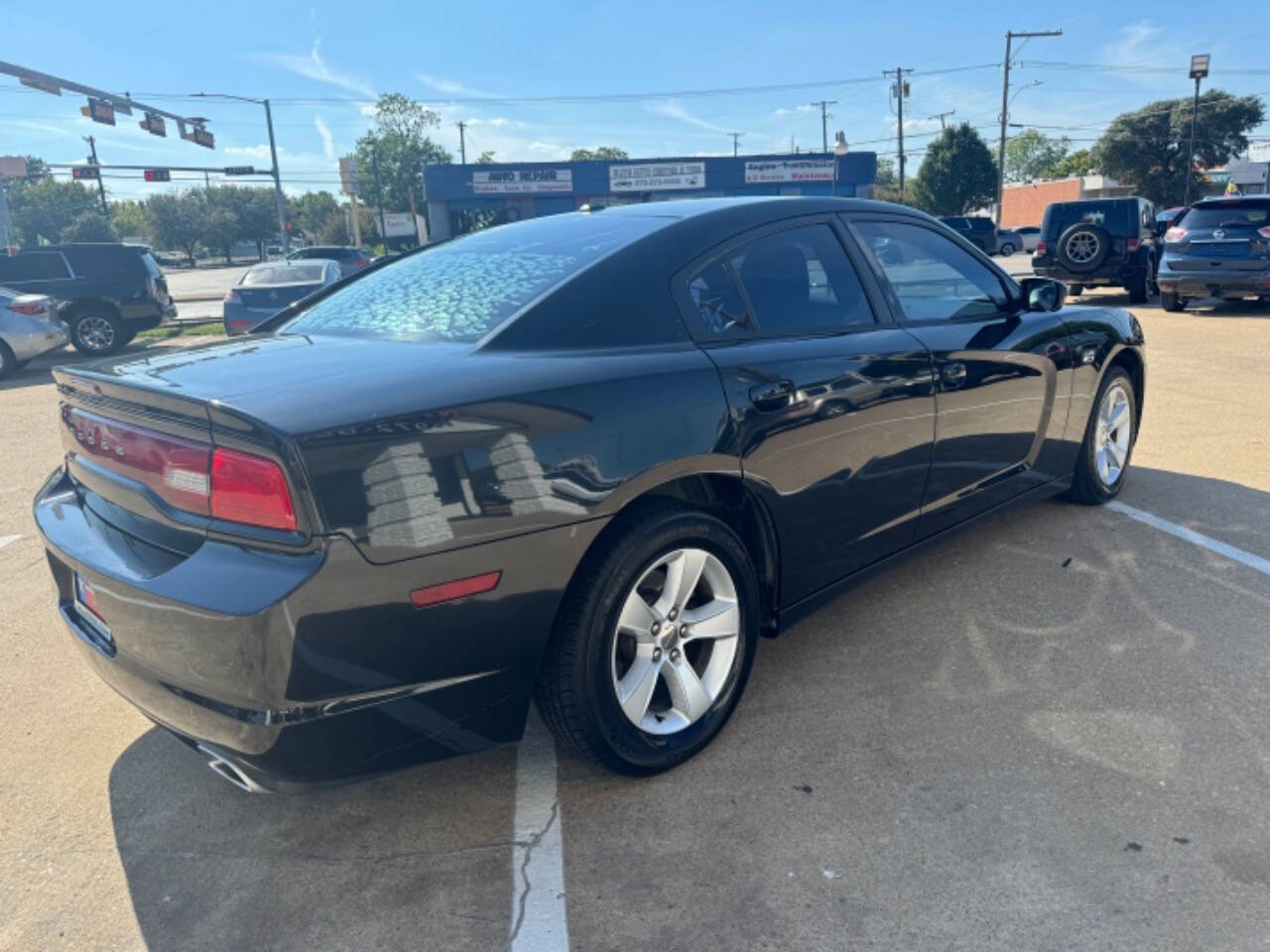 2011 Dodge Charger for sale at NTX Autoplex in Garland, TX